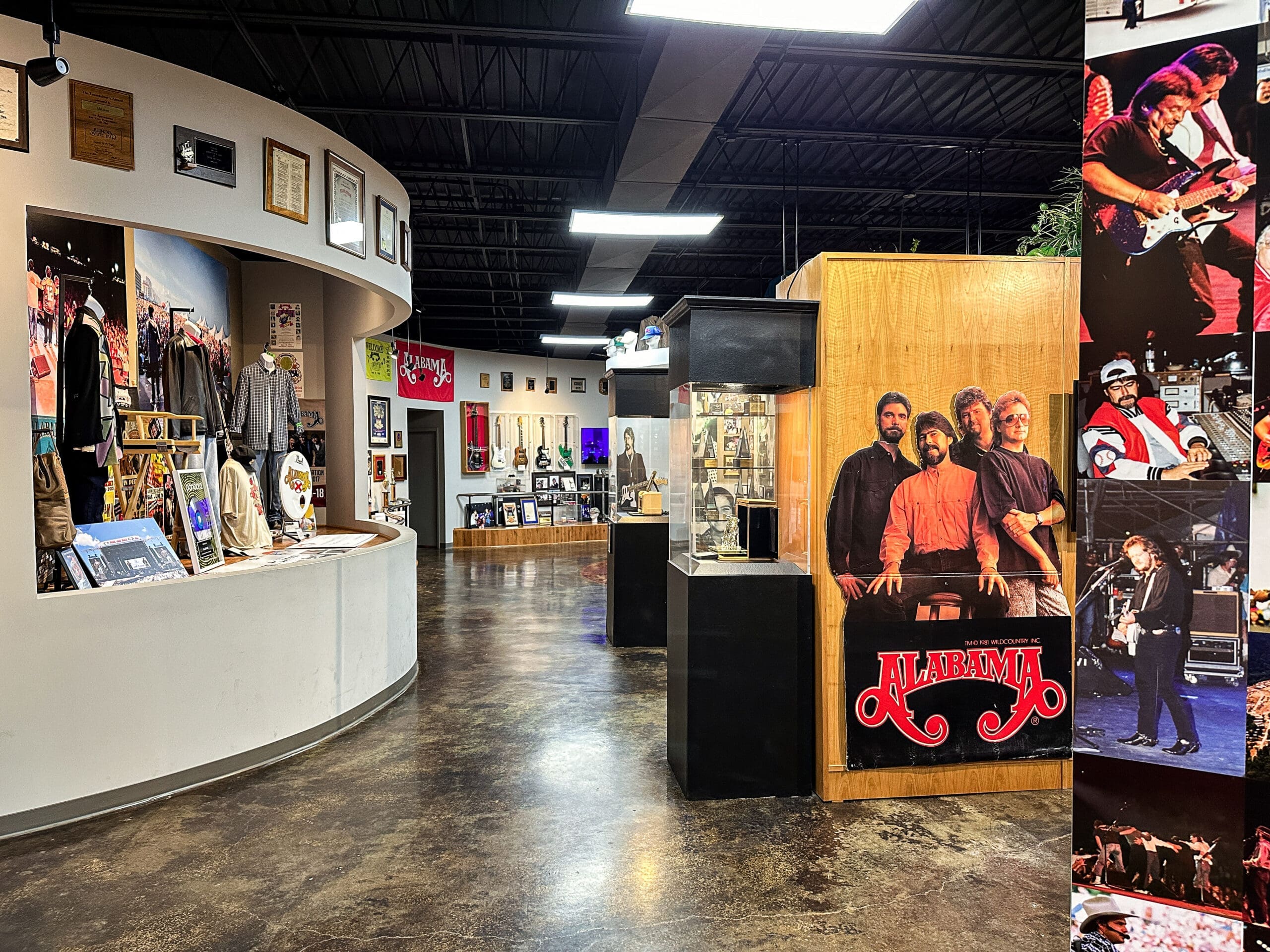 Large room with various music memorabilia on display.