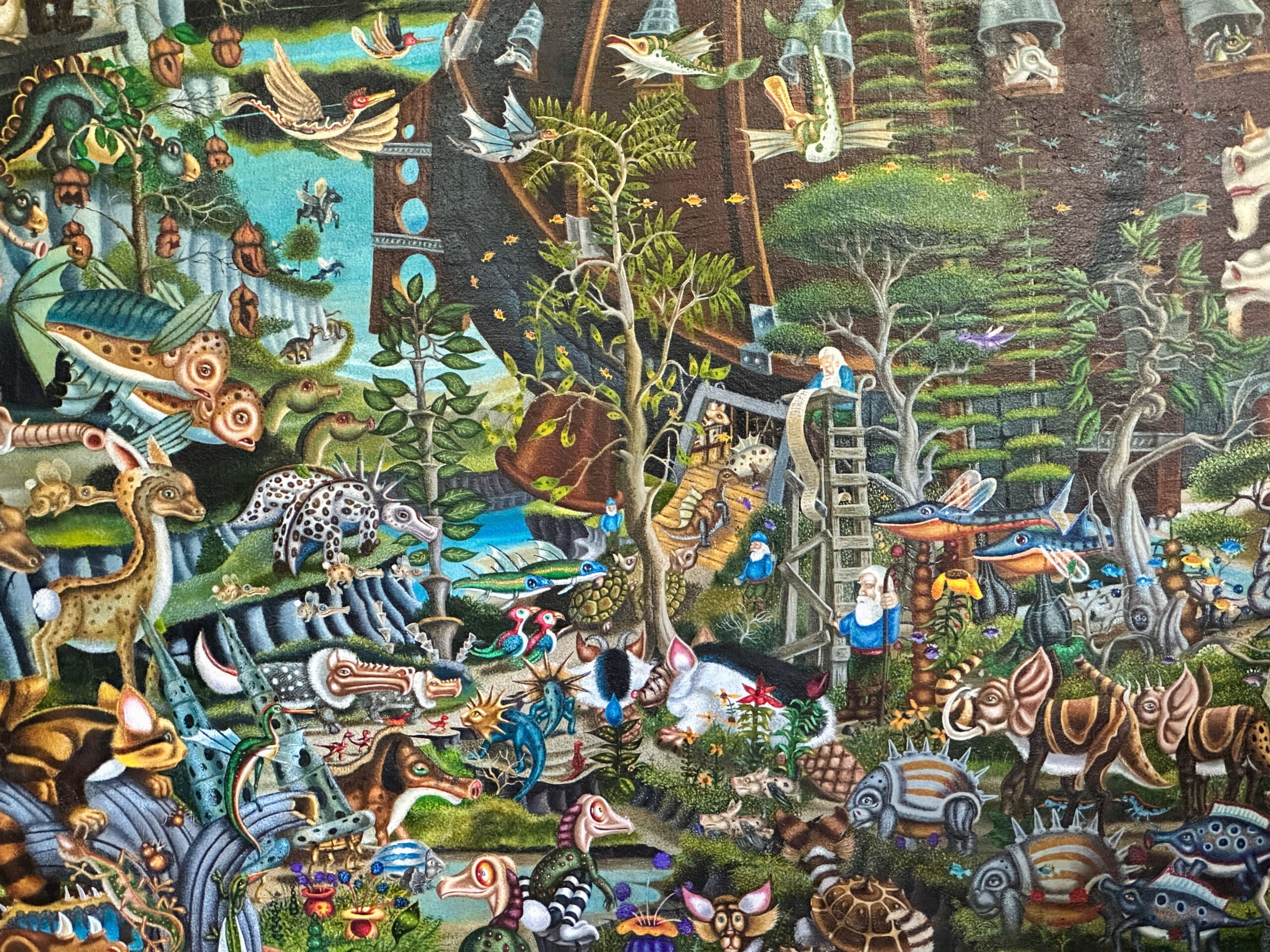 A detailed close-up of a colorful, psychedelic interpretation of Noah's Ark featuring Noah checking a long list as a menagerie of made-up creatures stands before him.